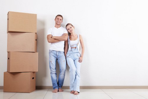 Moving boxes and furniture prepared for a Collierswood home relocation