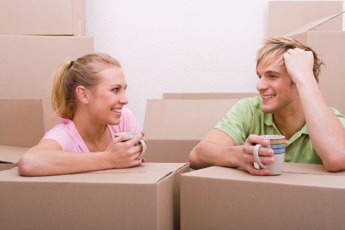 Packed boxes and furniture ready for loading in a local move