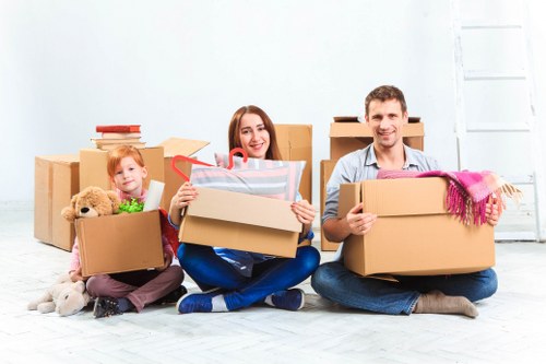 Moving van and boxes for a home move in Colliers Wood
