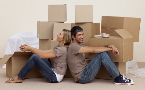 Removal team planning a move in Colliers Wood near local residential streets
