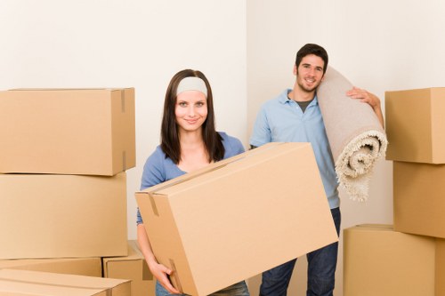Team member assessing risks before lifting furniture