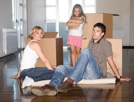 Loading furniture into a removal truck near Colliers Wood homes